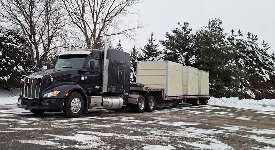 step-deck-trailer-hauling-freight
